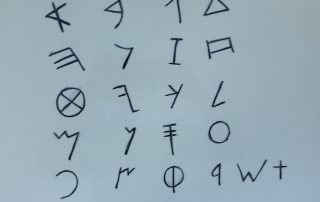 Cosmic education at International Montessori School Berlin-origin of writing-runes